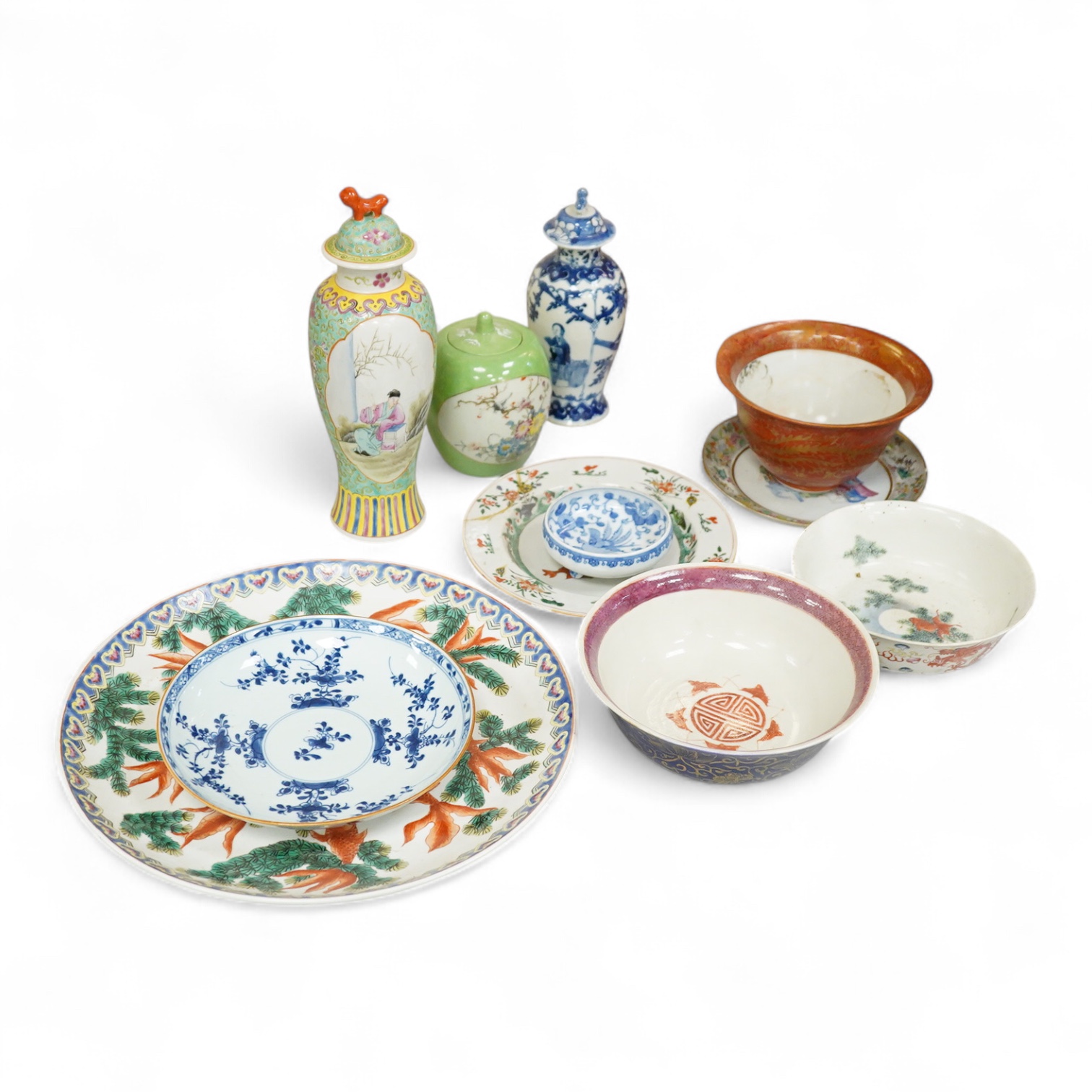 A collection of Chinese ceramics, 18th century and later to include a blue and white vase and cover, ‘goldfish’ charger and various bowls, largest 36cm in diameter
